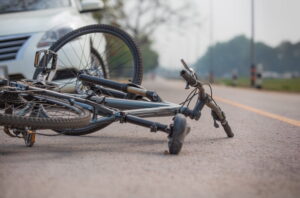 Bicycle knocked to the ground after a collision with a vehicle in West Palm Beach representing a bicycle accident injury claim handled by Rosenthal Levy Simon and Sosa